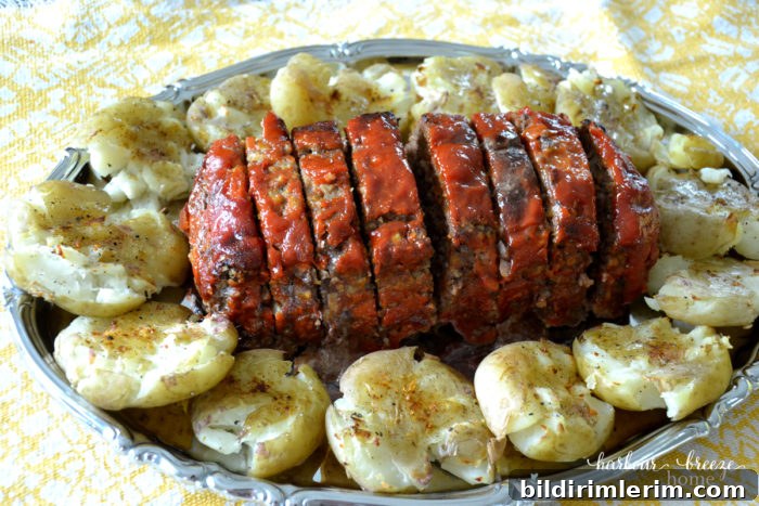 Dinner Party Recipes for New Hosts That Impress 6 Meatloaf and smashed potatoes on a platter ready to serve for a dinner party.