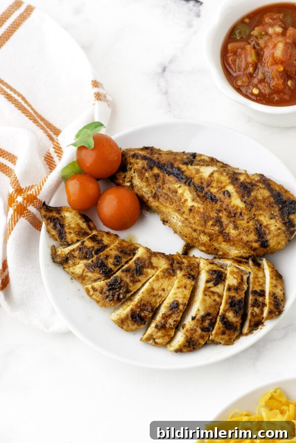 A plate of mexican chicken breast after it has been grilled.