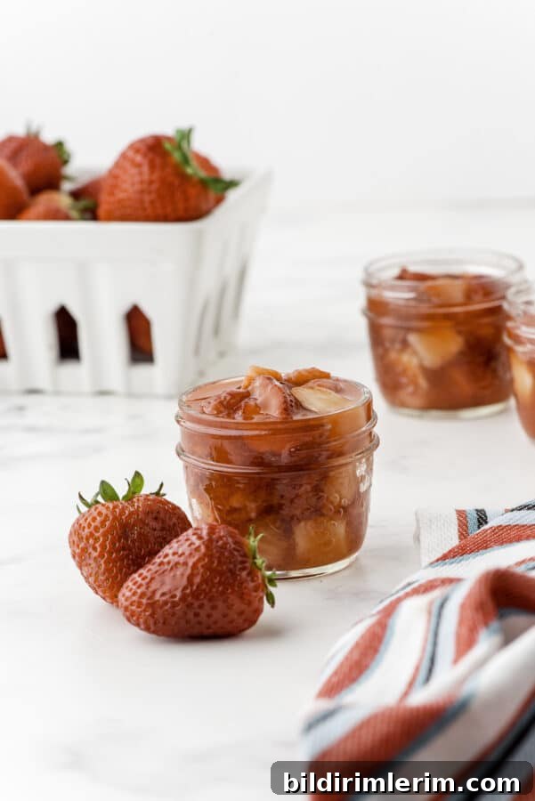 Strawberry sauce in a mason jar