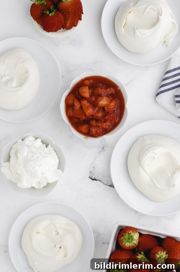 Close-up of a strawberry pavlova topped with whipped cream and strawberries