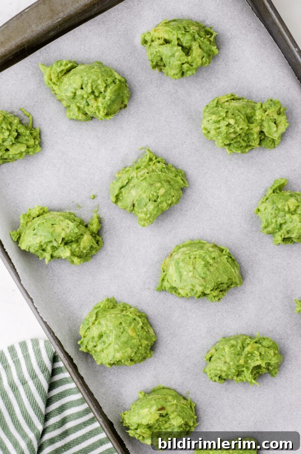 Use a trigger ice cream scoop to portion out half avocado sized portions