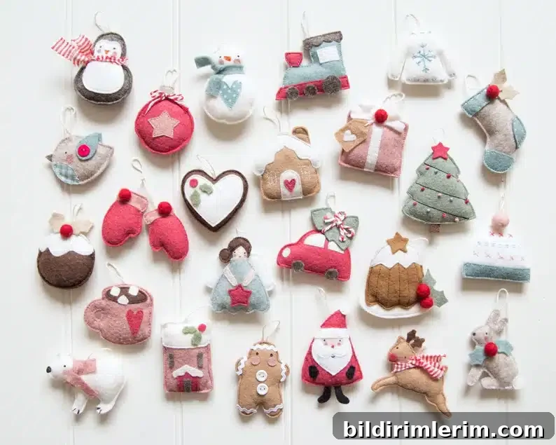 A set of felt Christmas ornaments in a bunch of different Winter Wonderland themed shapes