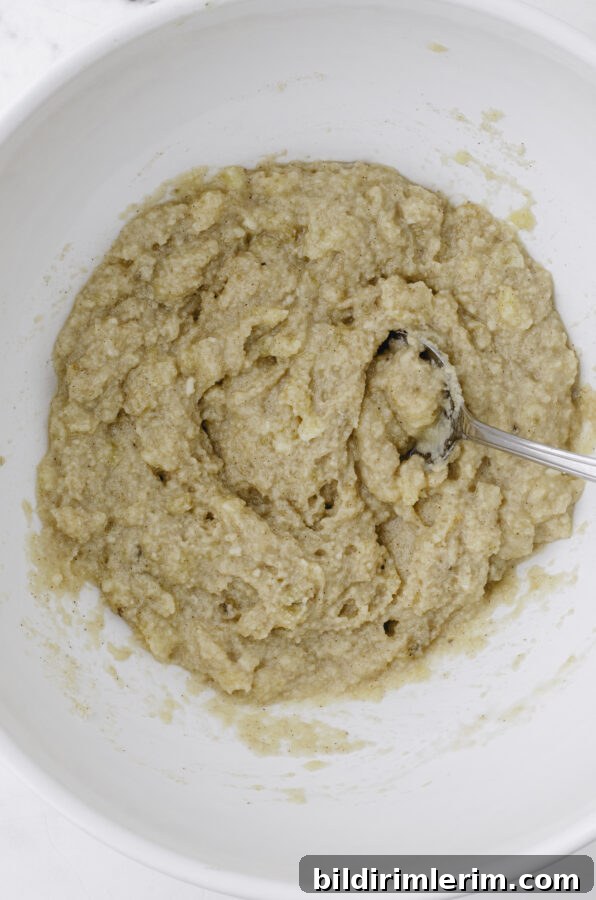 Mini Banana Bread Cookie Bites Recipe 5 Banana bread cookie dough mixed together in a large bowl.