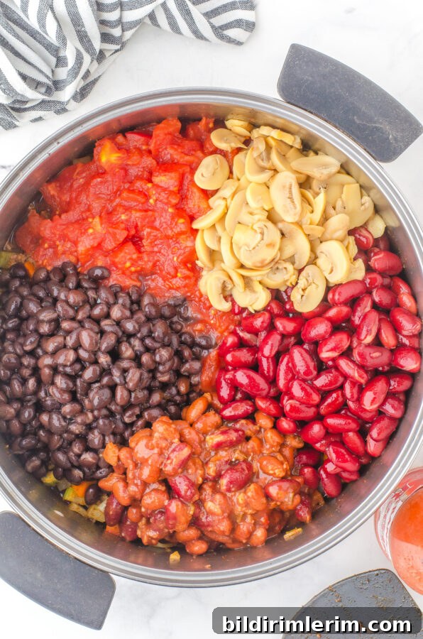 Warm Up with Classic Ground Beef and Bean Chili 5 Chili simmering in a pot