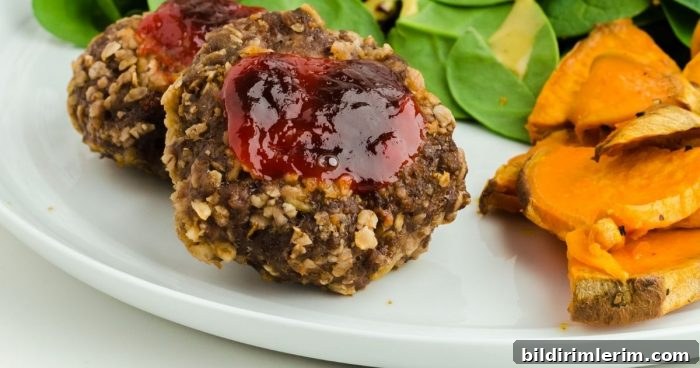 oven baked hamburger steak with barbecue sauce on it
