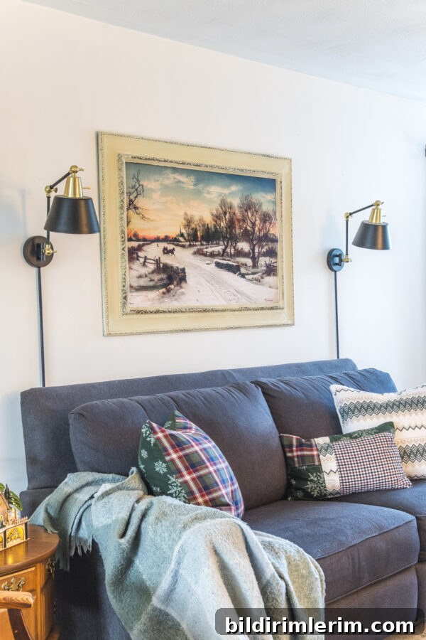 The Christmas Morn vintage wall art print hung above a couch.