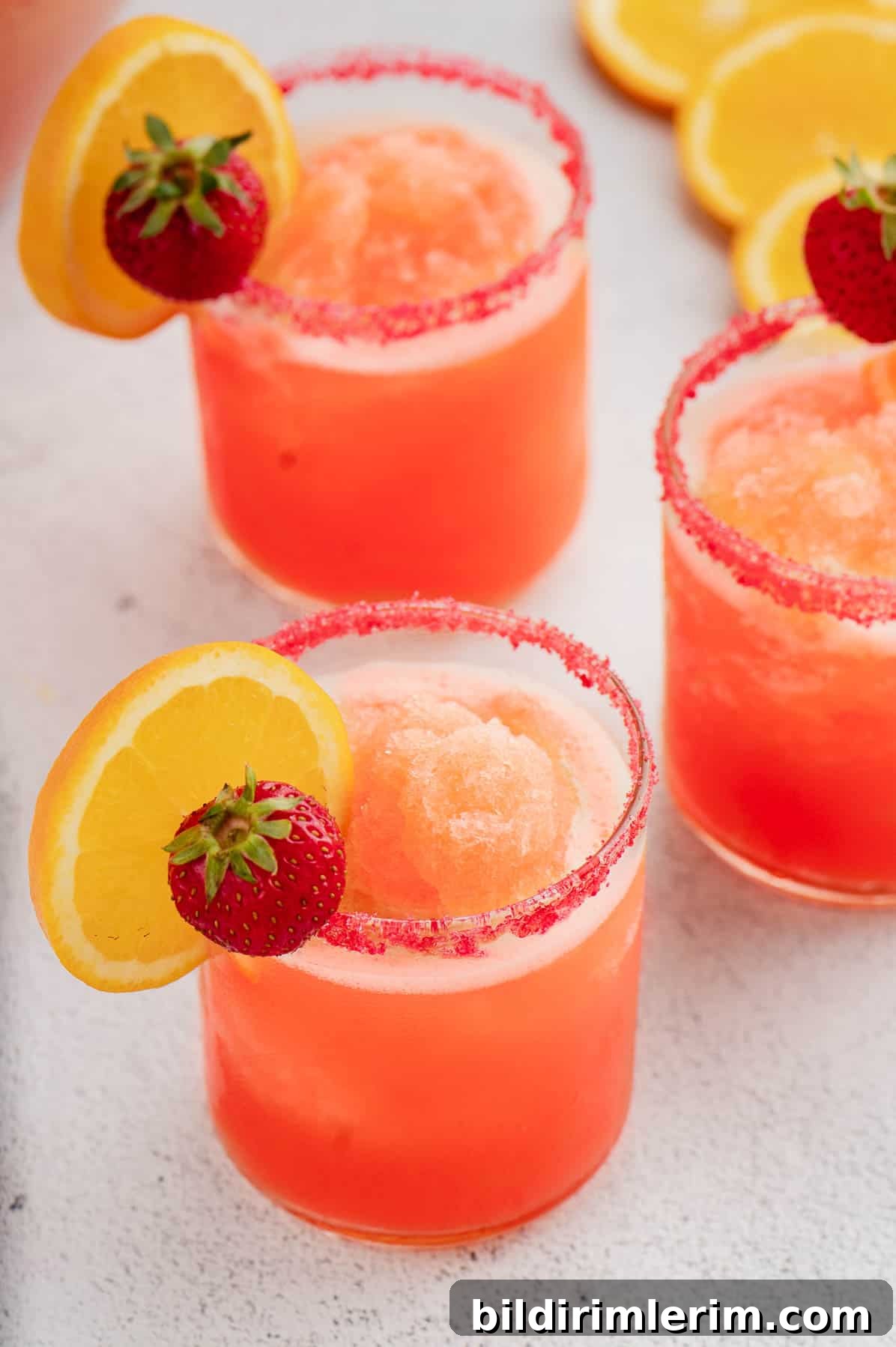 Festive Non-Alcoholic Punch Recipes for Holidays and Parties 5 Glasses of red slush punch