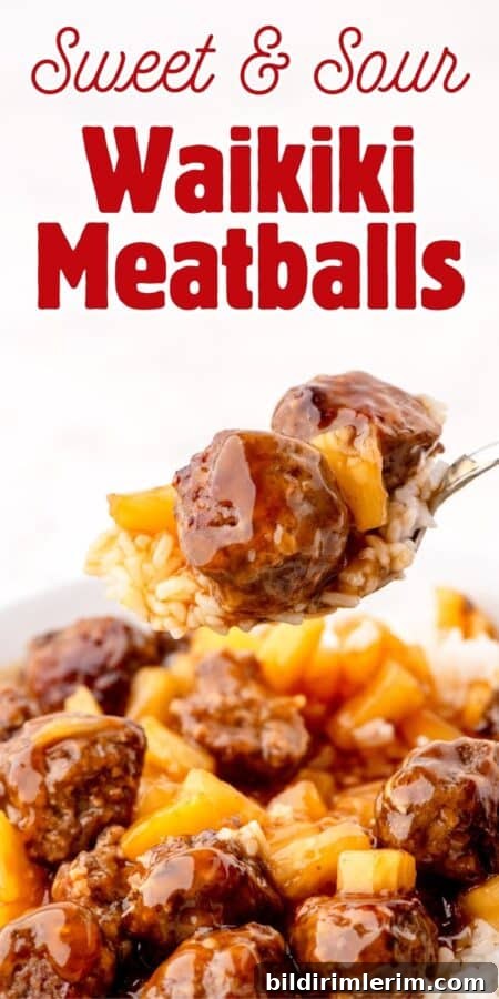 Waikiki Sweet and Sour Meatball Recipe with Pineapple Tidbits 8 Forkful of sweet and sour meatballs with pineapple tidbits over a bowl of Waikiki meatballs over rice.