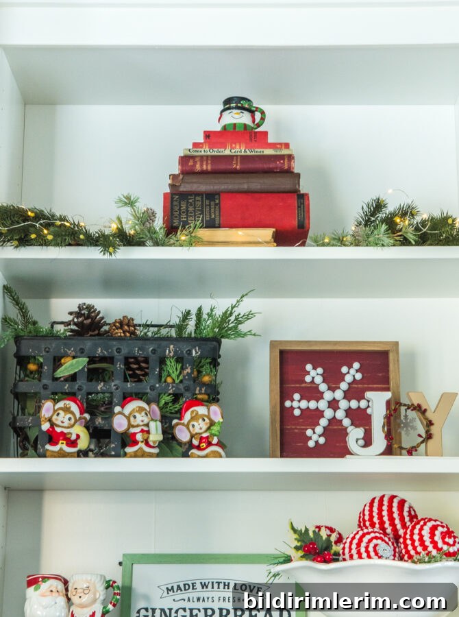 Books stacked up to look like a Christmas tree in a bookshelf