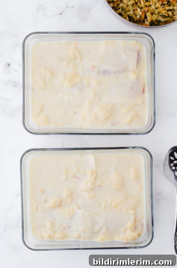 Swiss Chicken Casserole with Savory Stuffing 5 Soup and milk mixture poured over chicken