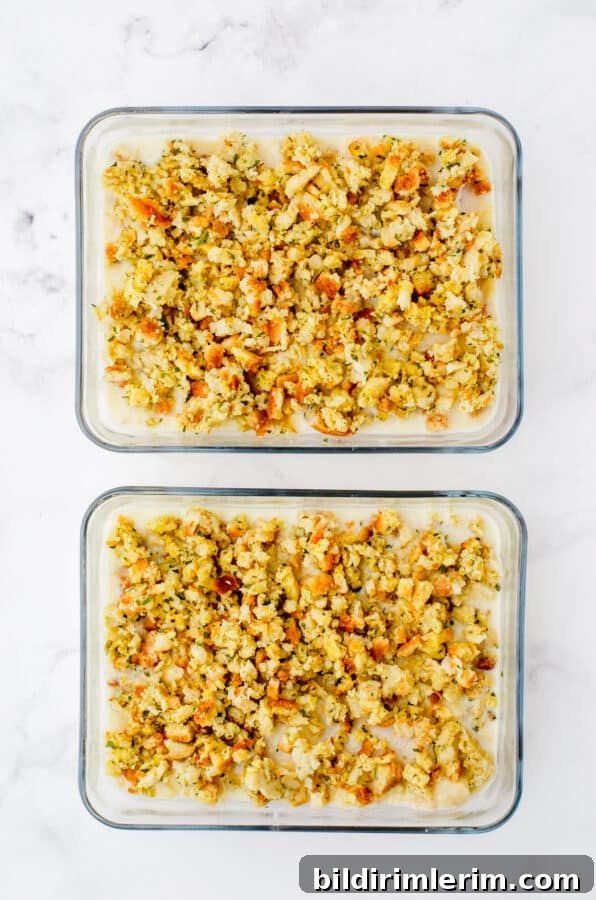 Swiss Chicken Casserole with Savory Stuffing 6 Stuffing topping being added to the casserole