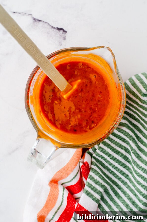 Apricot chicken glaze mixed in a bowl.