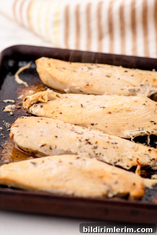Lemon chicken in a stoneware baking dish.