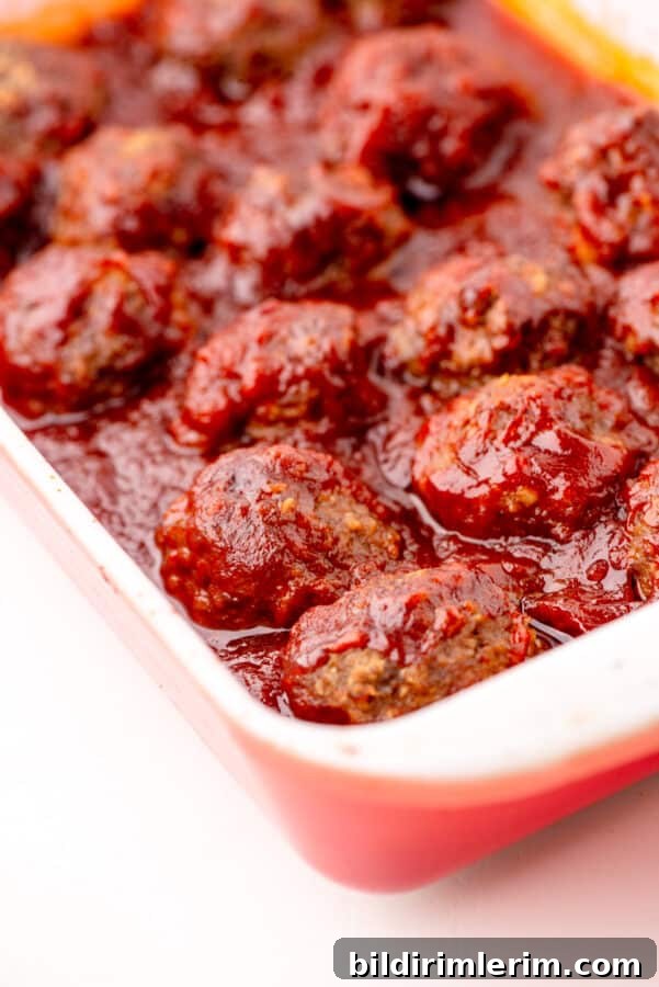 Baked meatballs with homemade barbecue meatballs sauce.