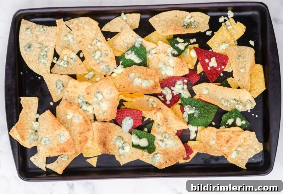 Baked blue cheese nachos on a sheet pan