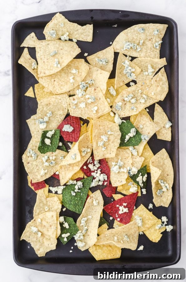 Crumble blue cheese over chips