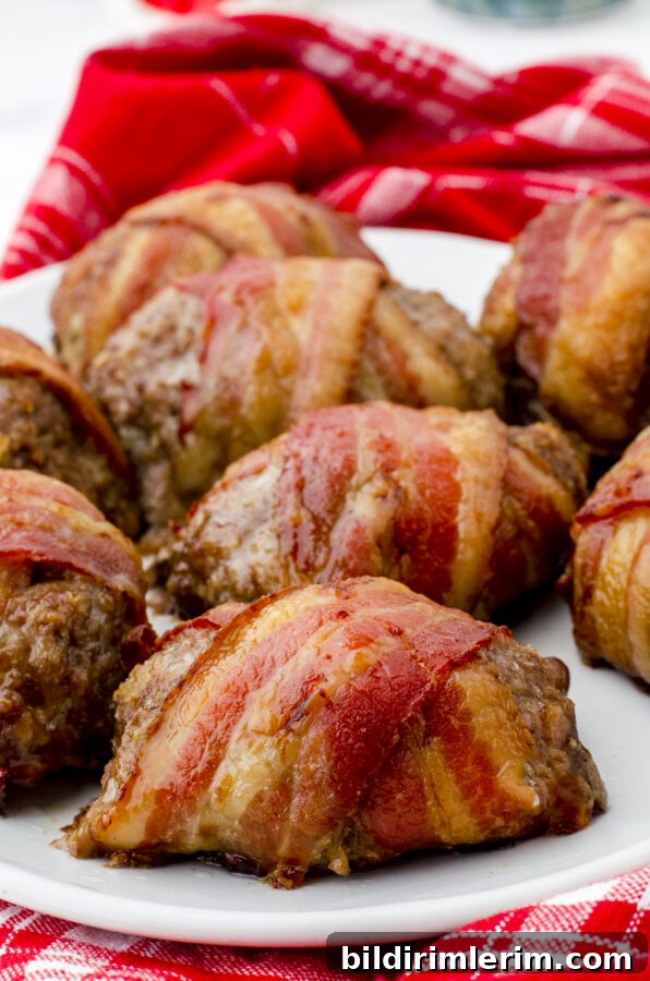 Individual mini meatloaf wrapped in bacon
