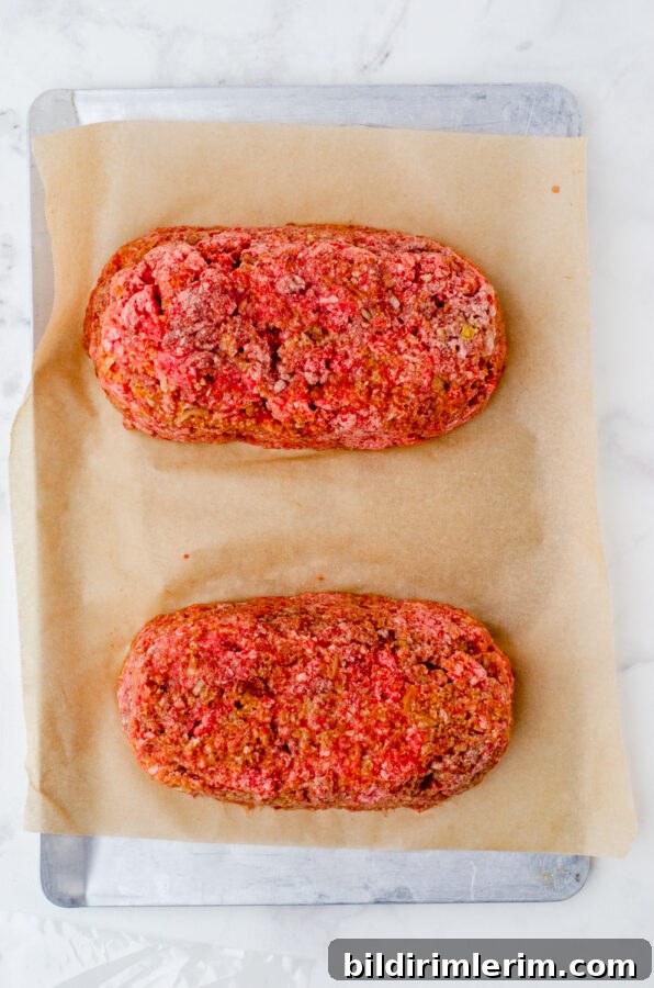 Classic Lipton Onion Soup Meatloaf Recipe for Comforting Dinners 4 2 meatloaves frozen on a cookie sheet lined with parchment paper