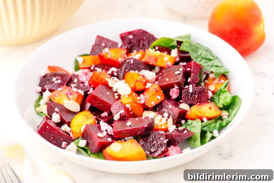 A bowl of beet and peach salad