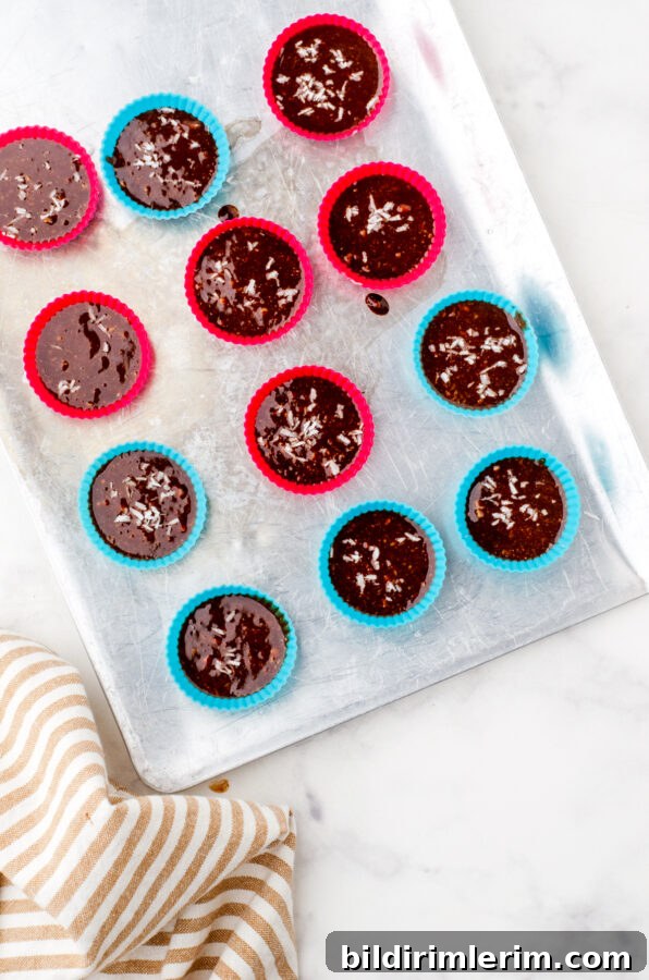 Muffin cups on a tray ready for freezer