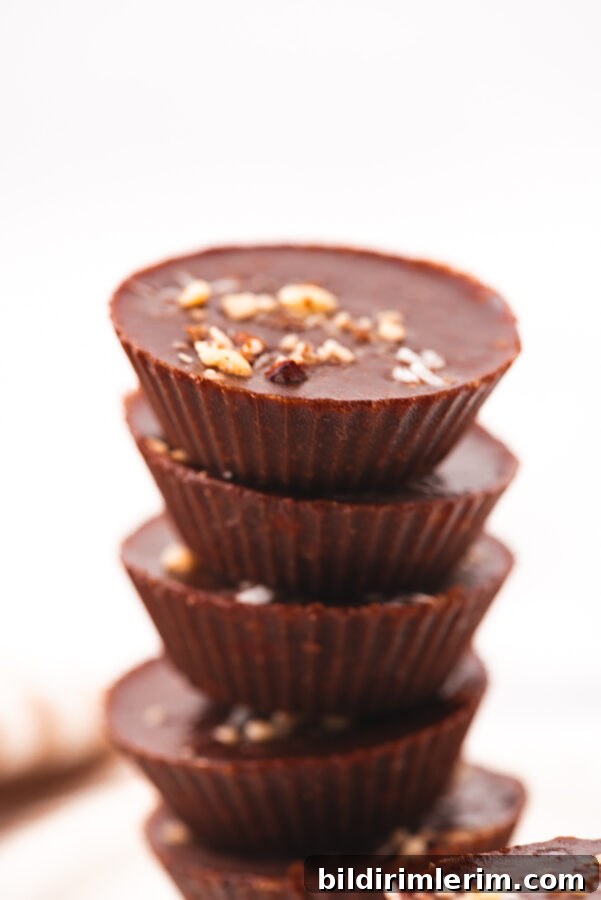 Almond butter cups stored in an airtight container