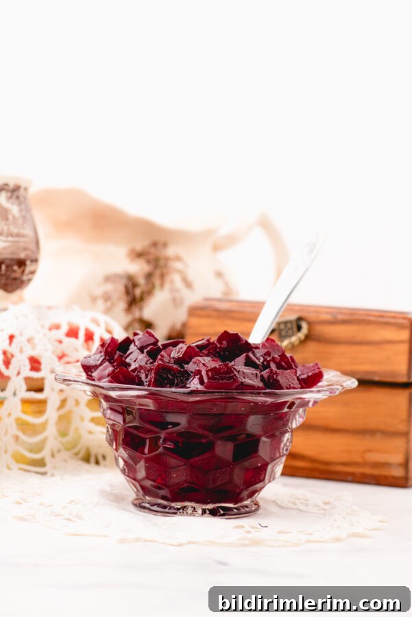 easy Harvard Beets in a serving bowl in front of an antique recipe card file