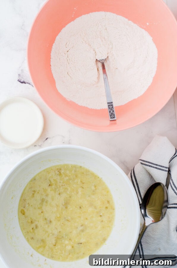 Dry and wet ingredients for banana cake in separate bowls