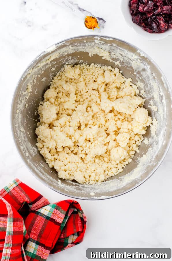 Whipped shortbread dough in a mixing bowl