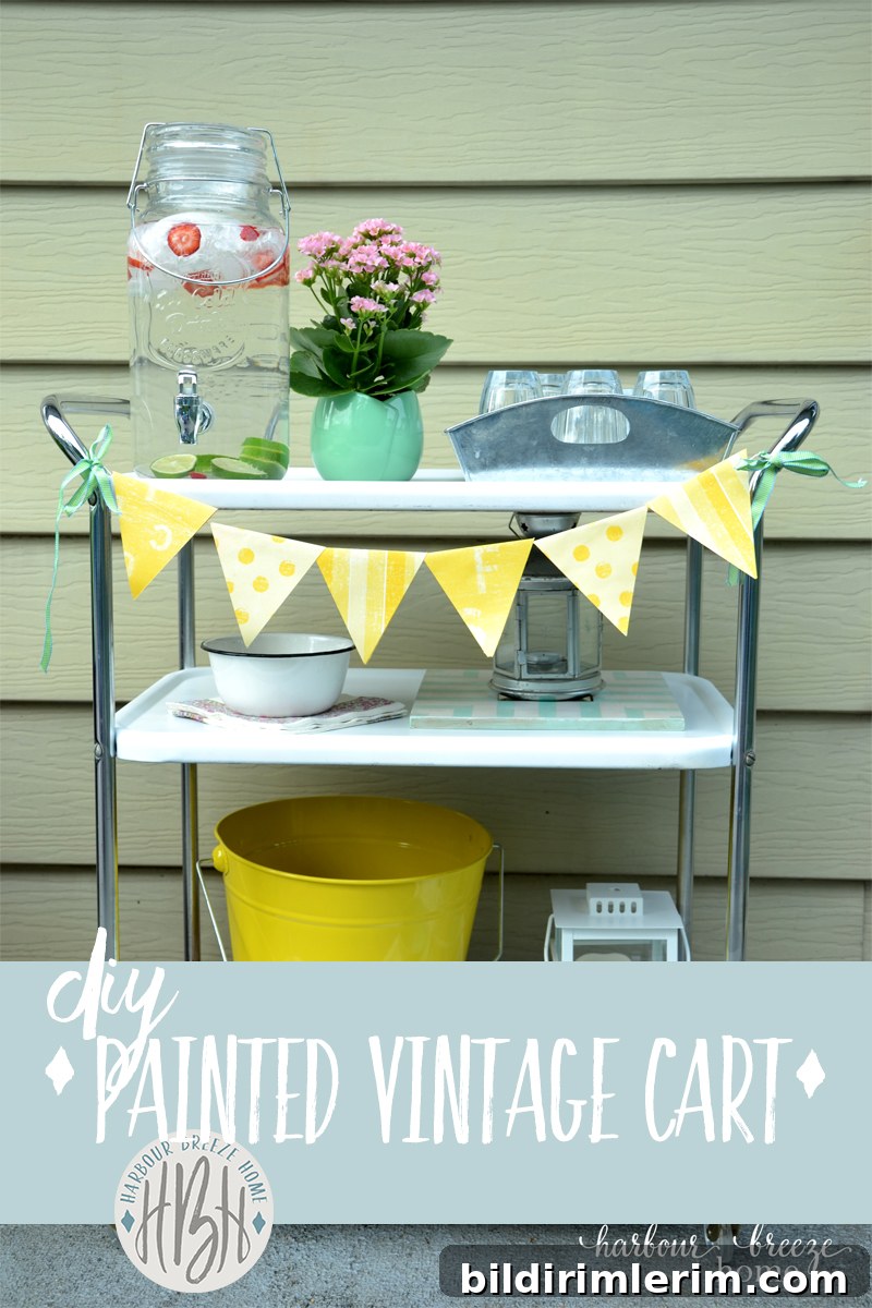 How to Use Spray Paint for a Vintage Metal Cart Makeover 3 tier rolling cart (that is a vintage metal cart) that has been painted with white spray paint and has chrome handles.