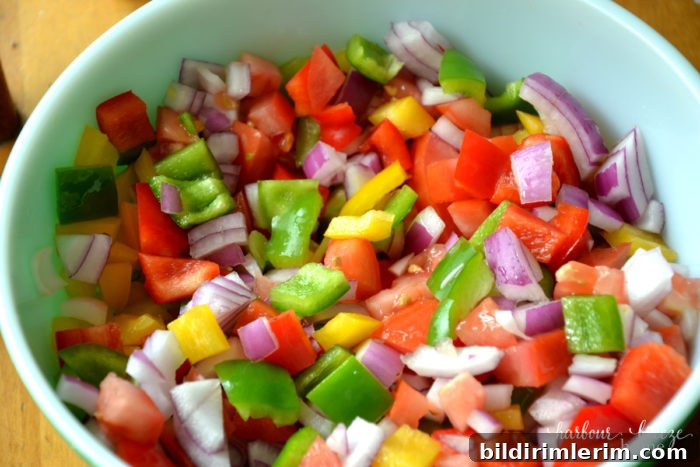 Greek Salad Meal Prep: Make-Ahead Lunch Recipe 6 Bowl of mixed Greek salad vegetables