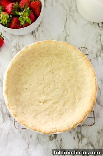 Strawberry Jello Pie Recipe with Grandma's No-Roll Crust 8 baked pie crust on a cooling rack