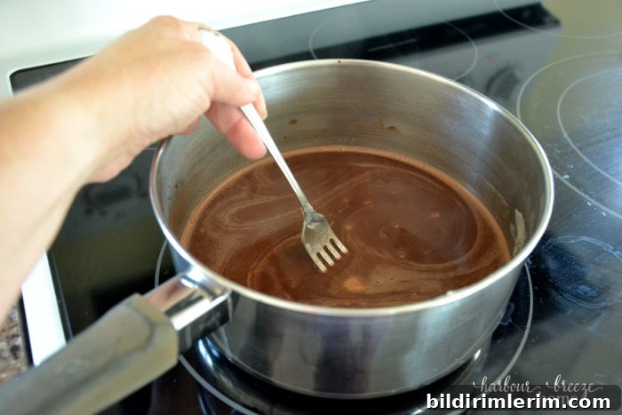 melting ingredients in a saucepan for texas sheet cake recipe