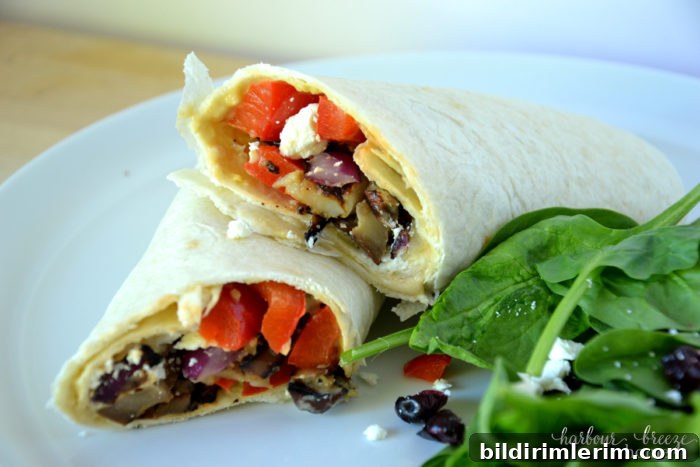 vegarian wraps with grilled vegetables on a plate.